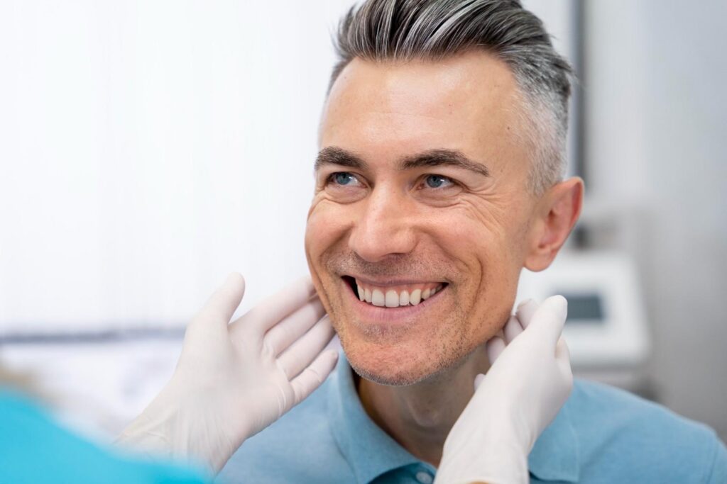 Smiling patient during a dental examination